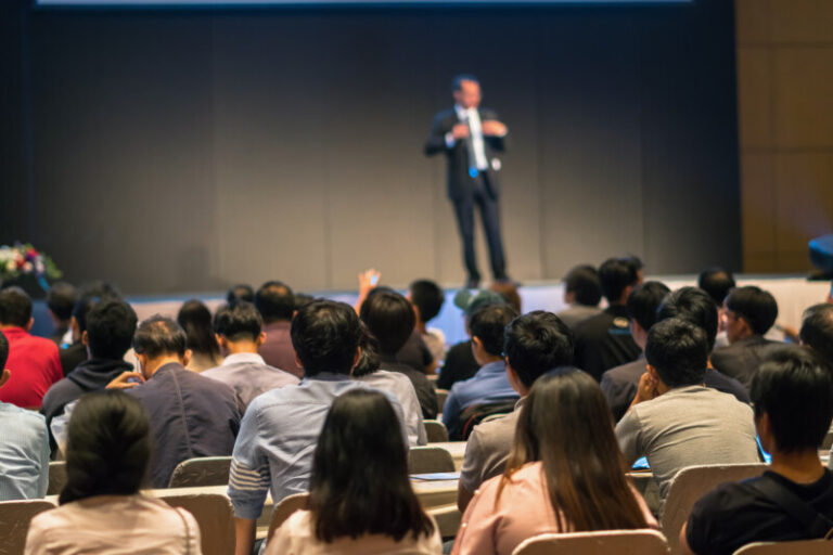 rear side of audiences sitting and listening the s 2024 10 21 08 45 31 utc